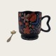 Black Ceramic Coffee Tall Cup With Flowers Black Ceramic Coffee Tall Cup With Flowers